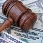 Gavel with cash, bankruptcy